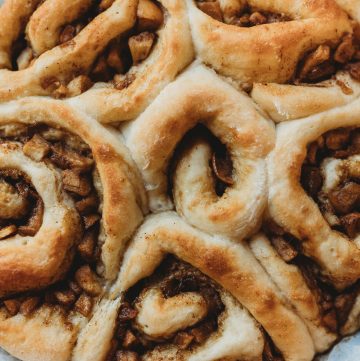 Apple Cinnamon rolls on parchment paper